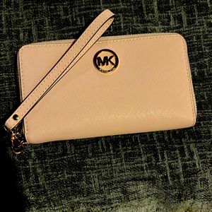 Light pink Michael Kors wallet/wristlet.